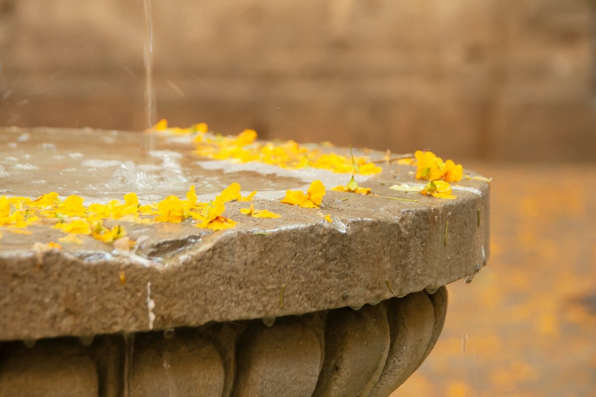 gray cement fountain